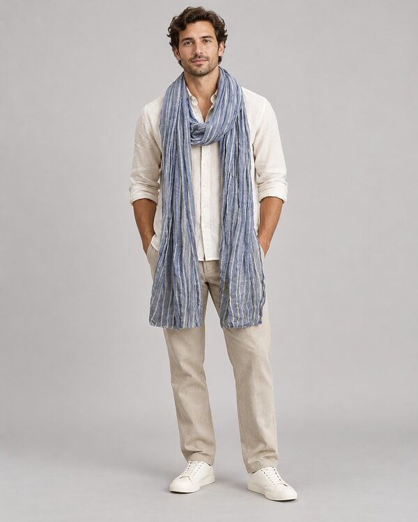 Blue and white striped crinkle woven scarf worn by a model, KK Fashion Exports