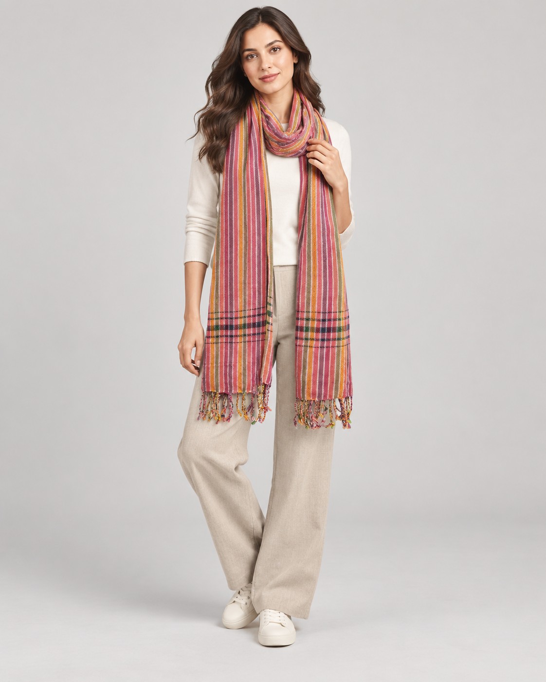 Pink and orange striped cotton towel scarf with fringe worn by a model, KK Fashion Exports
