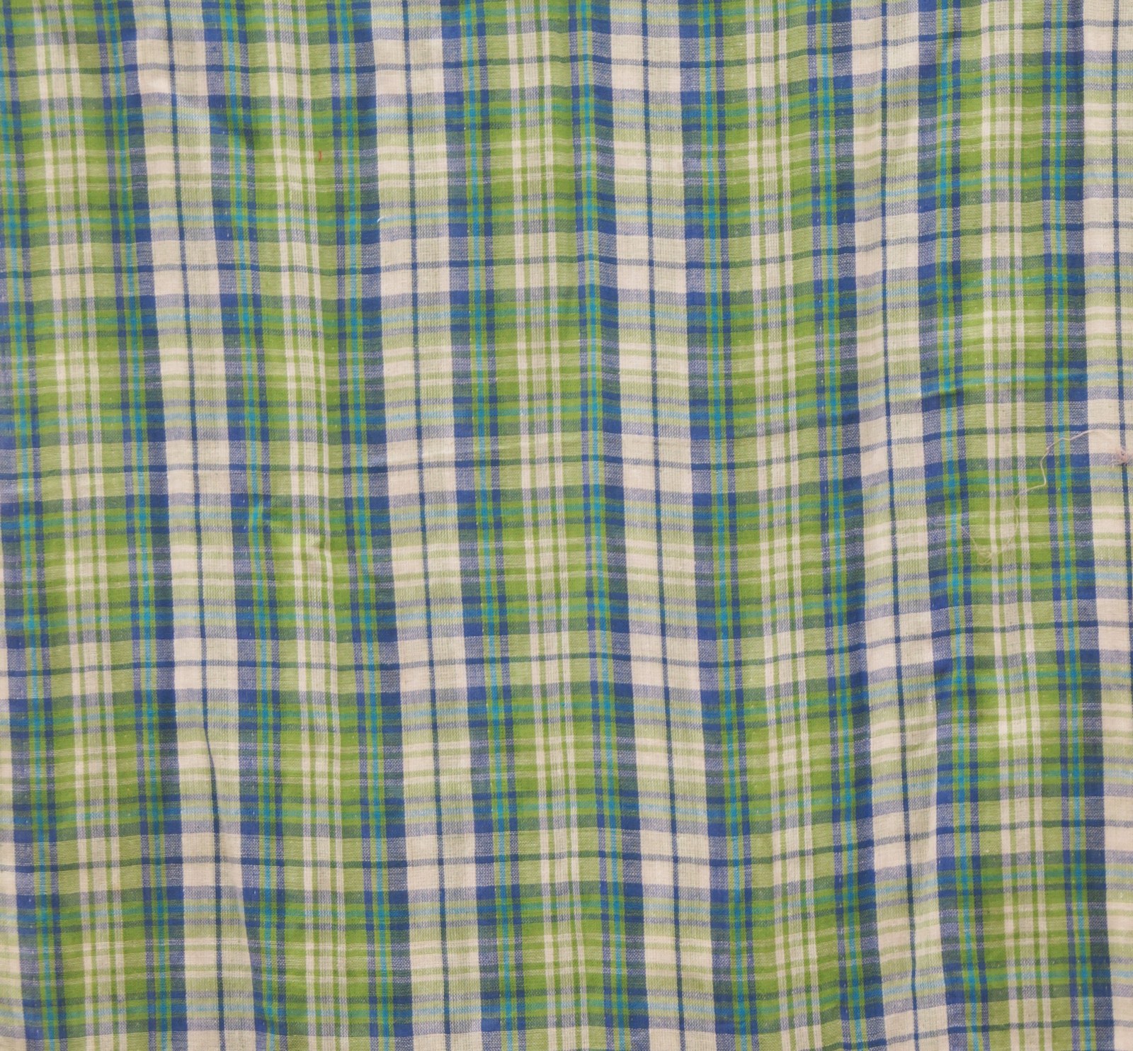 Blue and green check cotton scarf laid flat