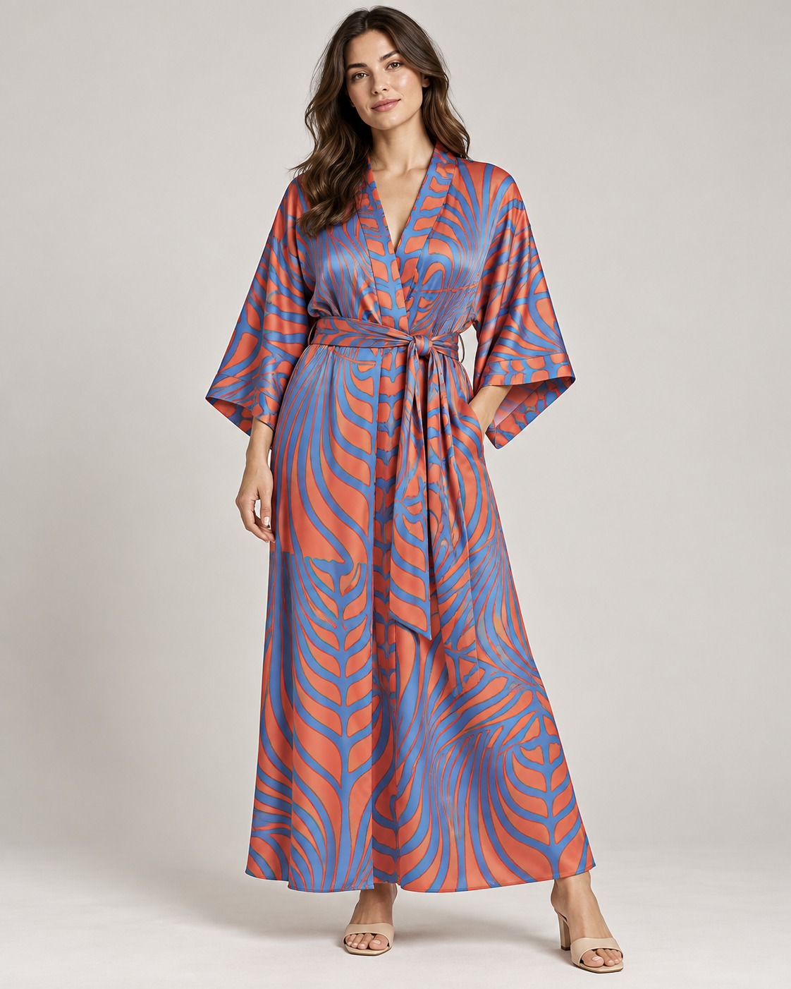 Satin belted ankle-length kimono in a symmetrical optical art radiating chevron wave linework print.
