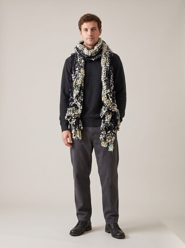 Navy and cream chunky knitted scarf worn by a model, KK Fashion Exports