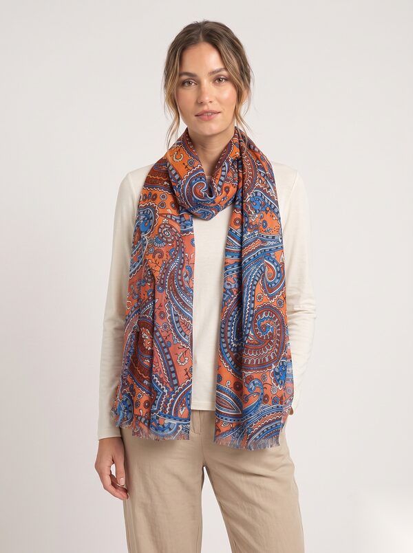 Orange and blue paisley print viscose shawl worn by a model, KK Fashion Exports