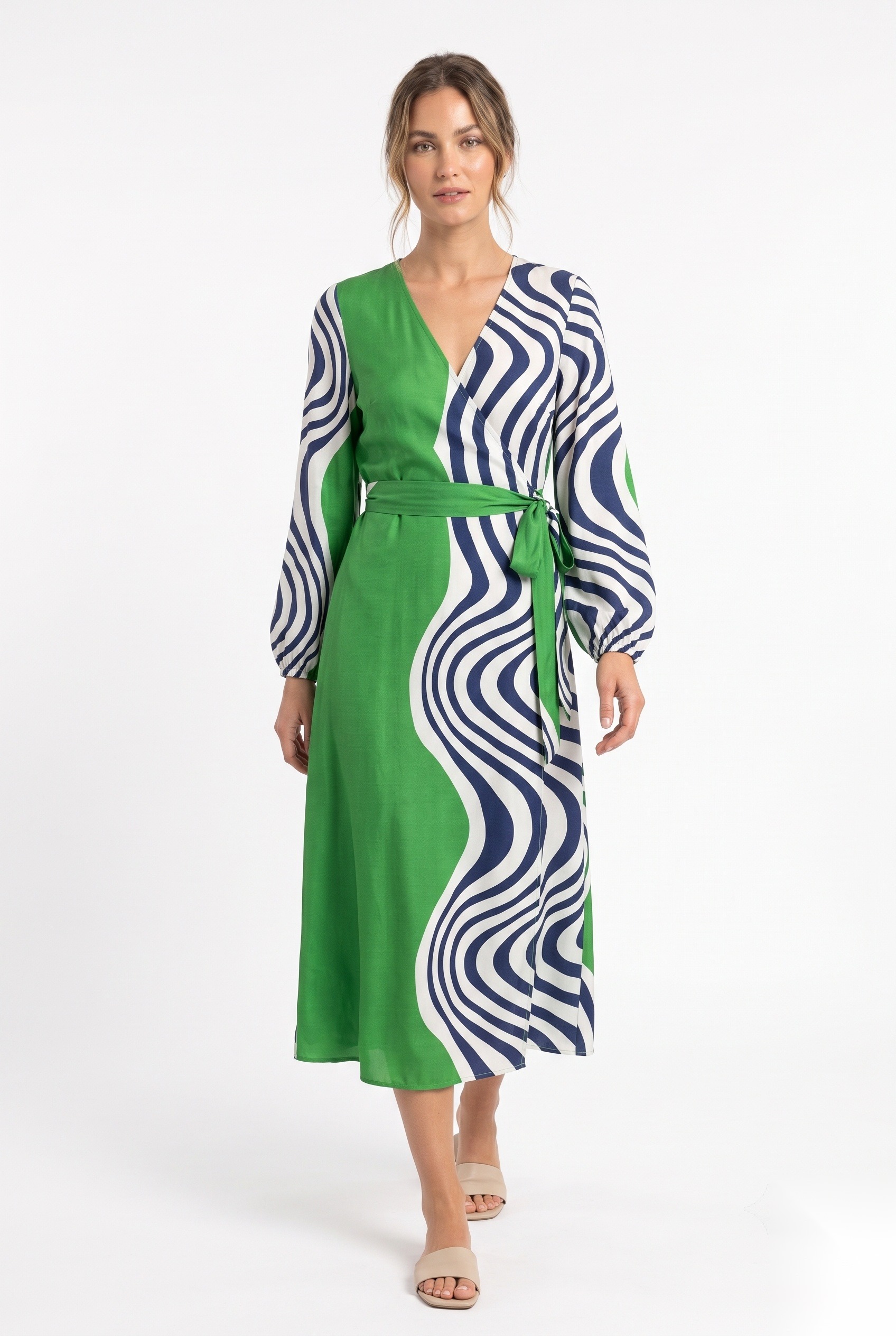 Silk wrap midi dress in a split-panel design with bold wavy optical stripes and solid block print.