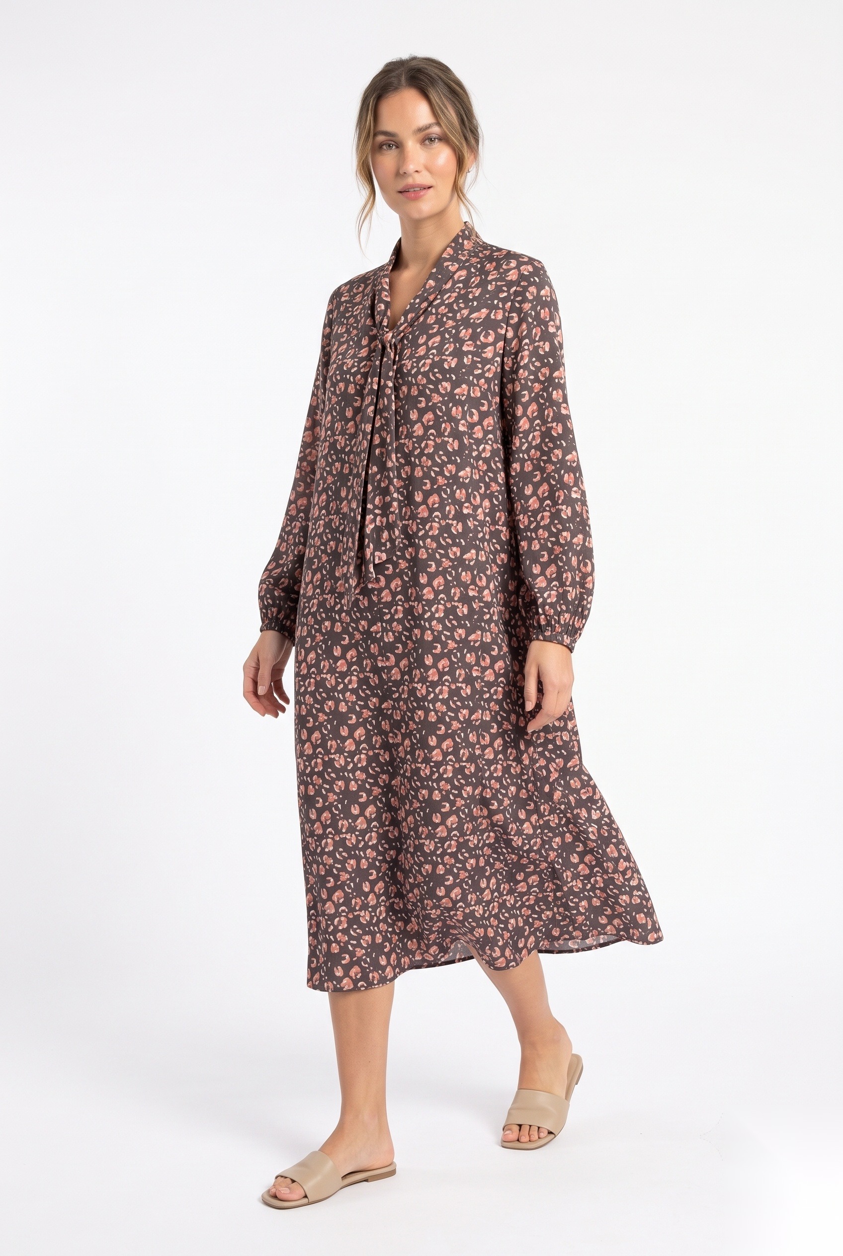 Silk relaxed shift dress with a tie neck in a dense micro ditsy multi-petal floral calico pattern print.