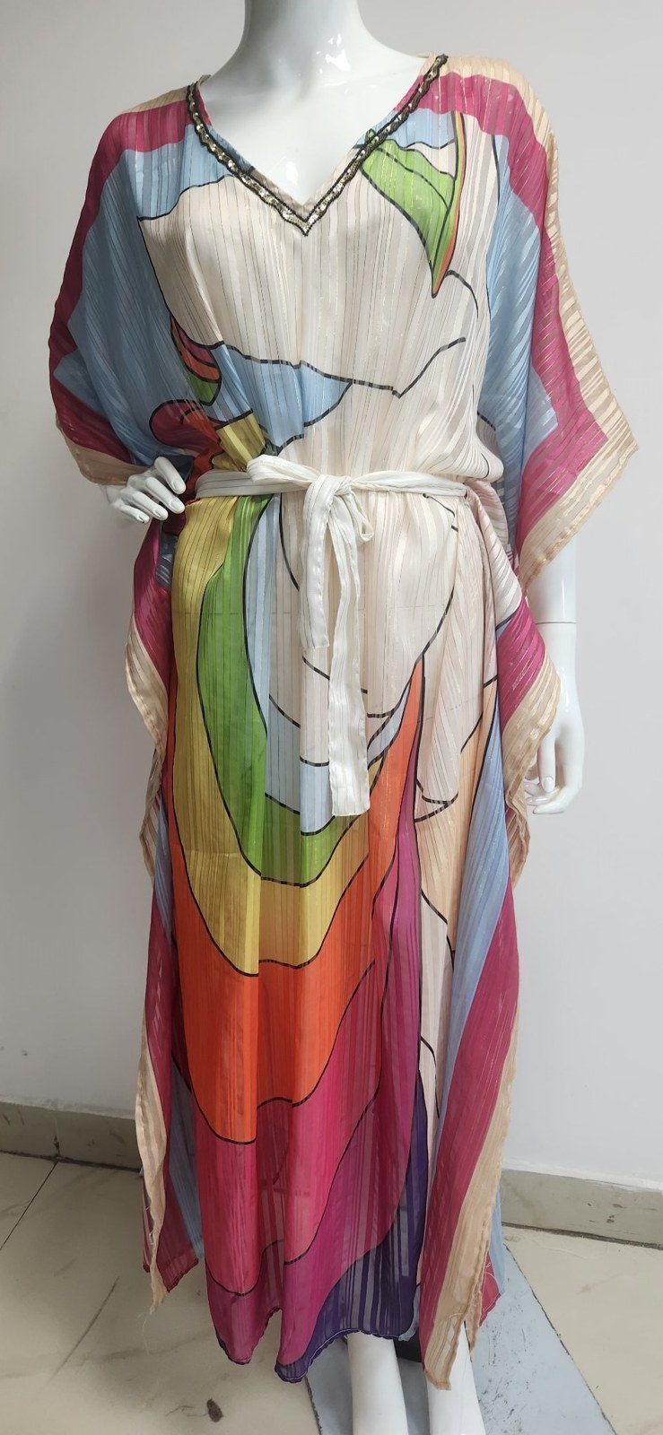 Long kaftan with a bright abstract print and tie waist