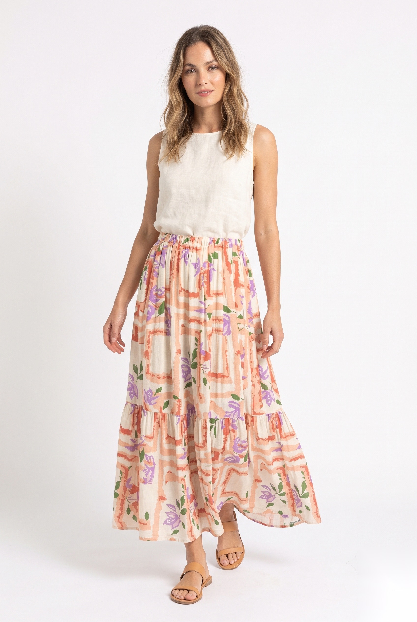 Linen tiered maxi skirt in a stylized flowers layered over abstract geometric frame grid print.