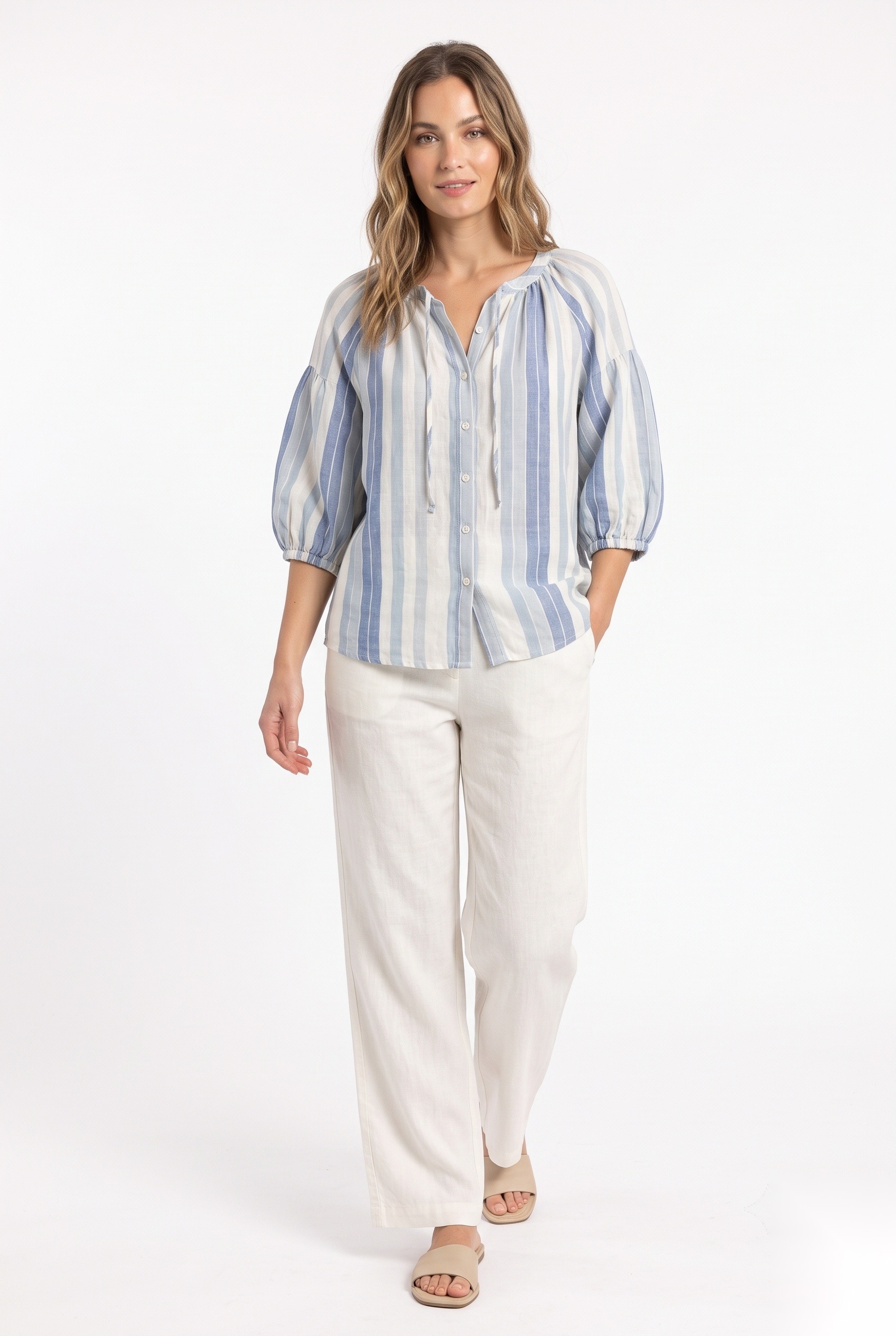 Linen peasant blouse with puff sleeves in a multi-width vertical striped parallel bands print.