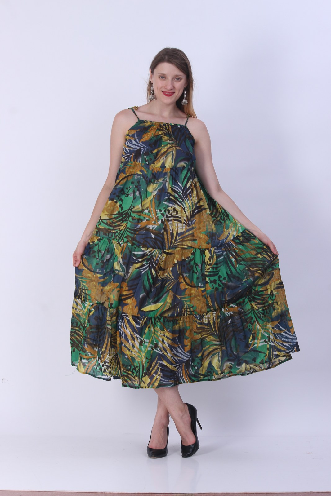 Green tropical leaf print umbrella dress with a full flared hem