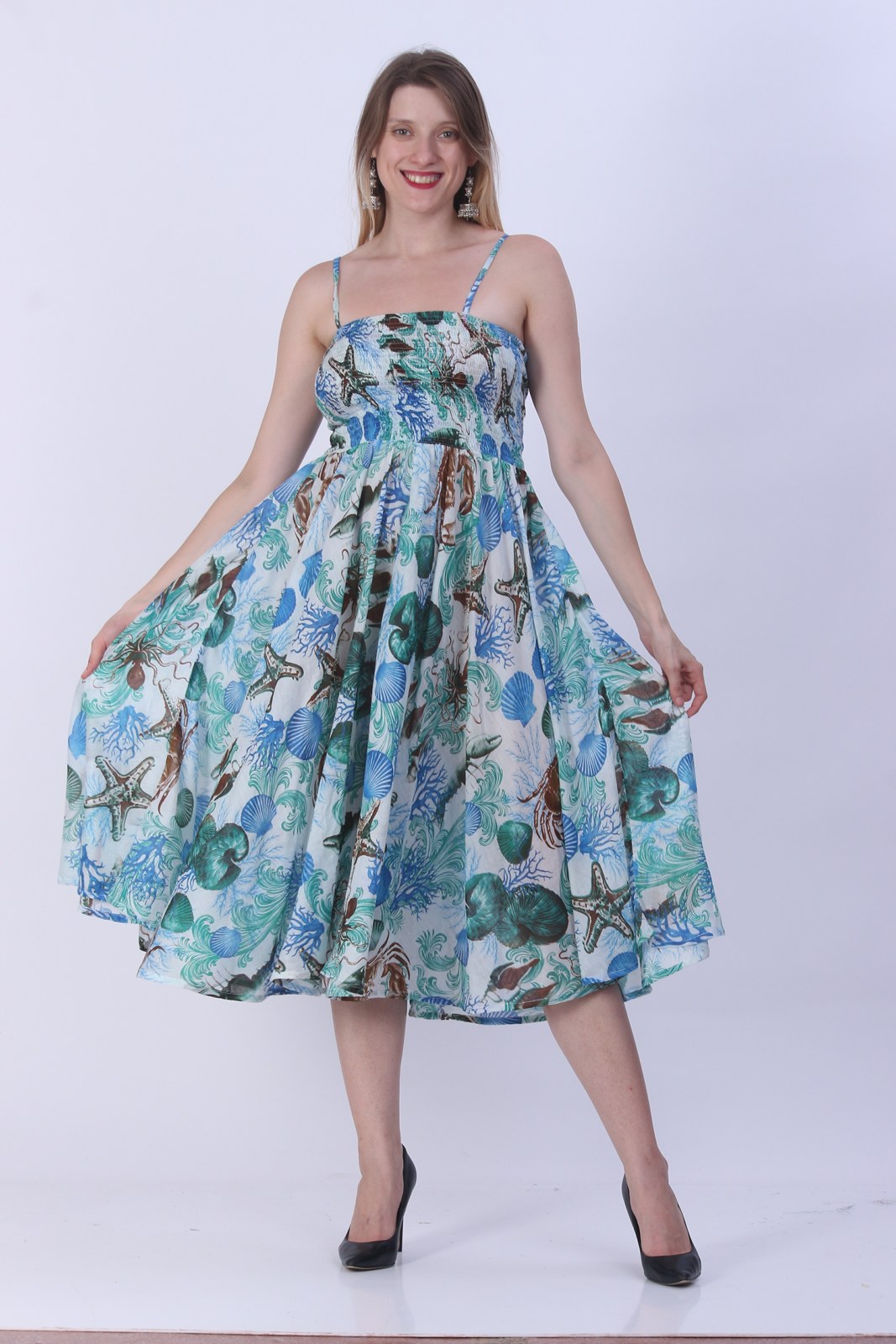Blue and white floral umbrella dress with spaghetti straps