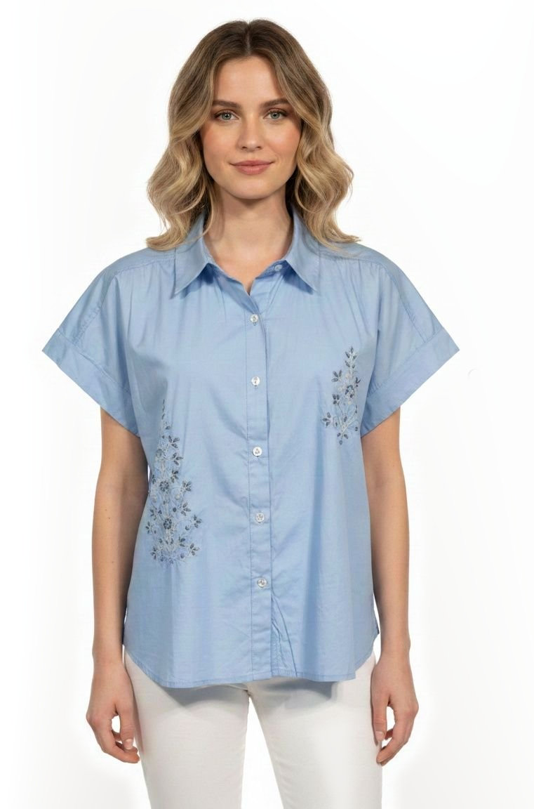 Light blue short-sleeve cotton poplin shirt with small embroidered motifs.