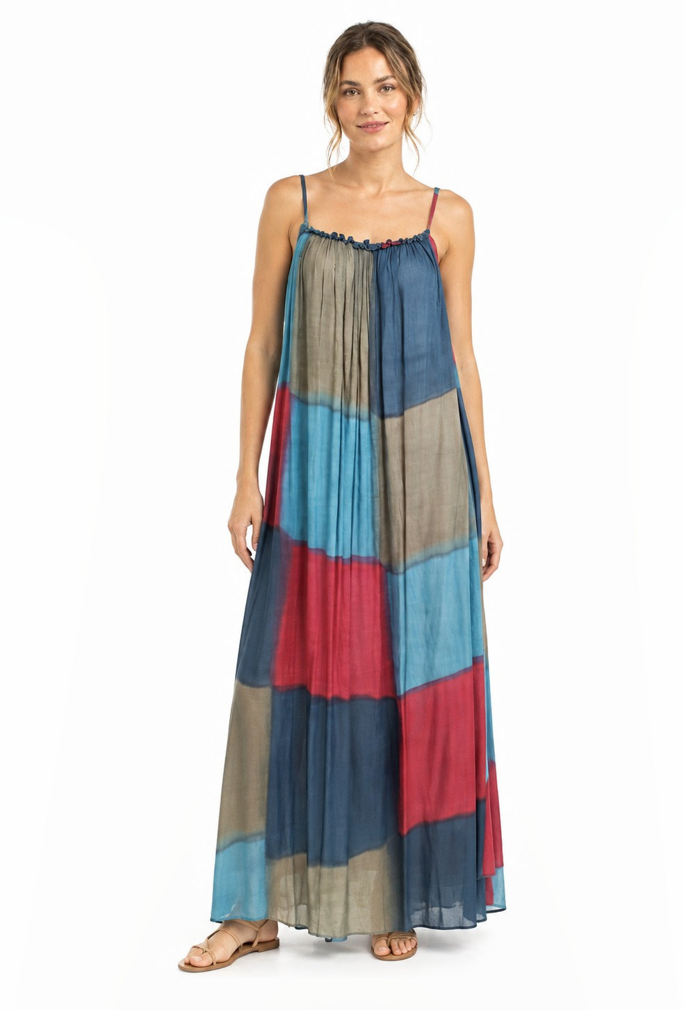 Strappy cotton maxi dress in a blue, red and beige patchwork block print.
