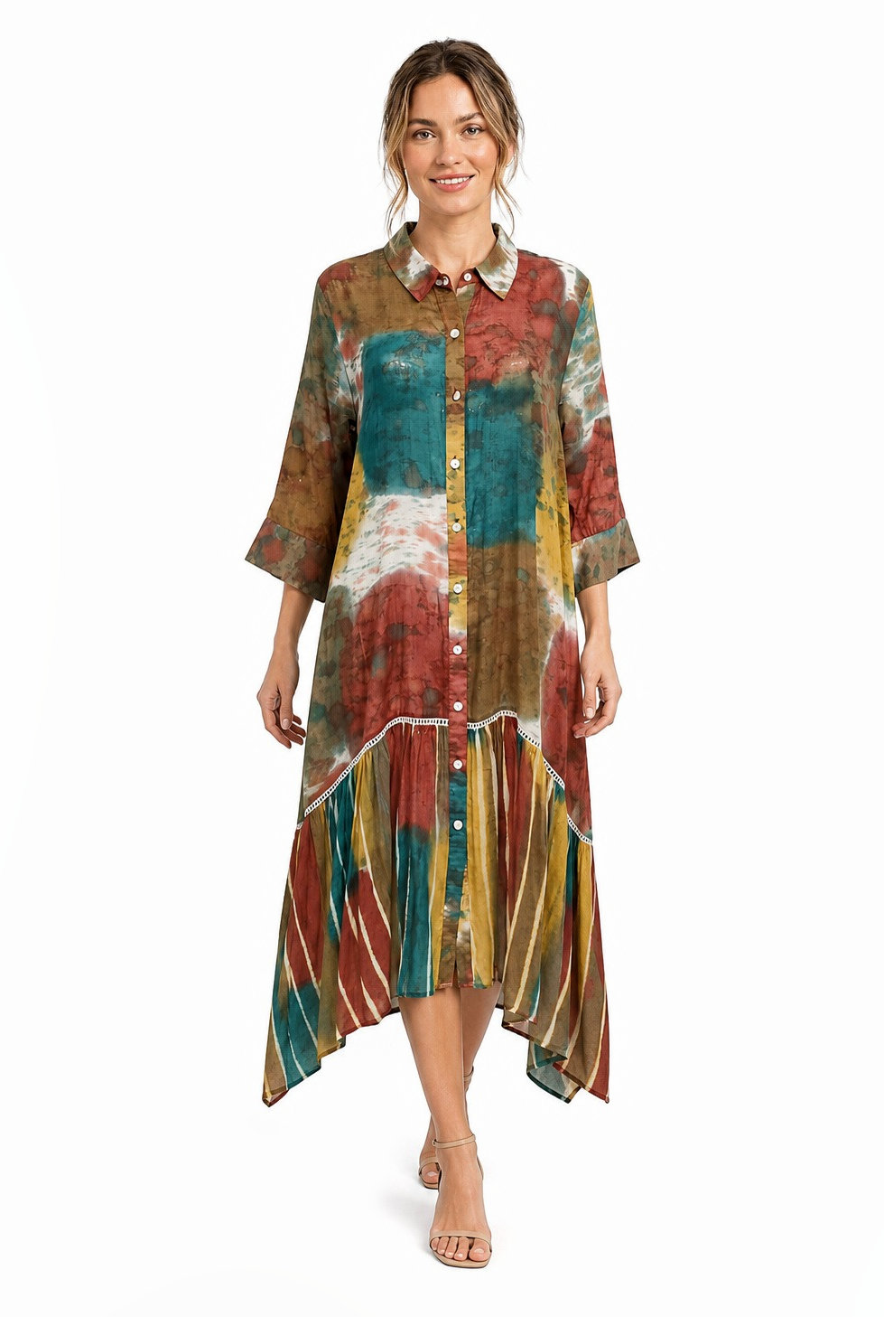 Button-front cotton shirt dress with a handkerchief hem in a green, rust and teal patchwork print.