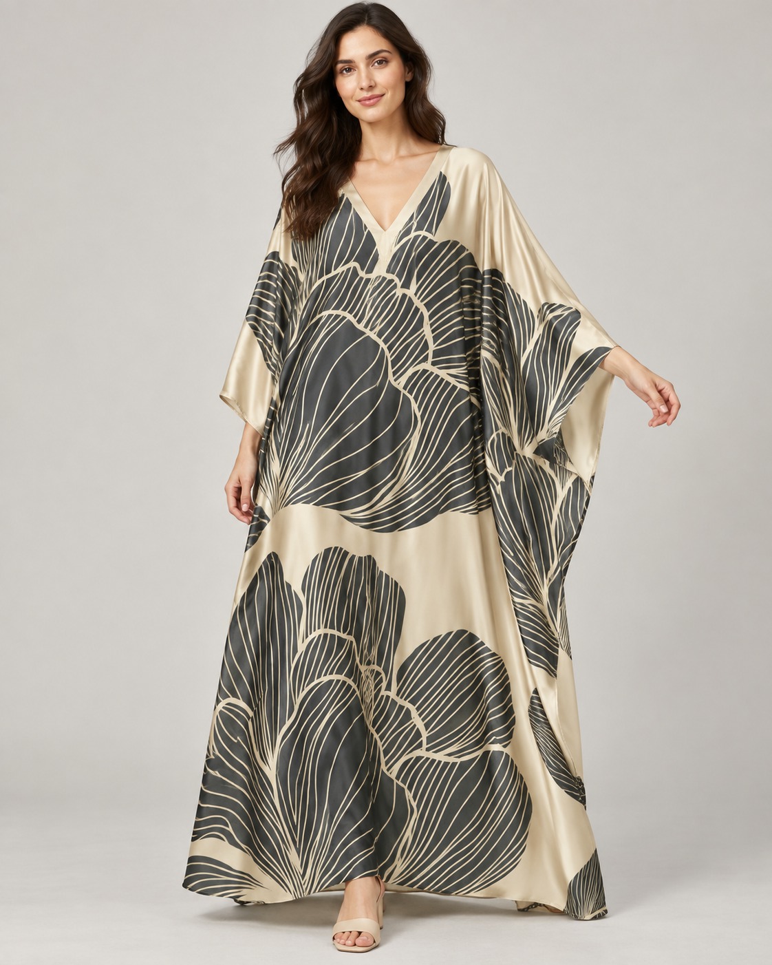 Satin long kaftan with a deep V neck and wide batwing sleeves in a large stylized poppies with dense linear-veined petals print.