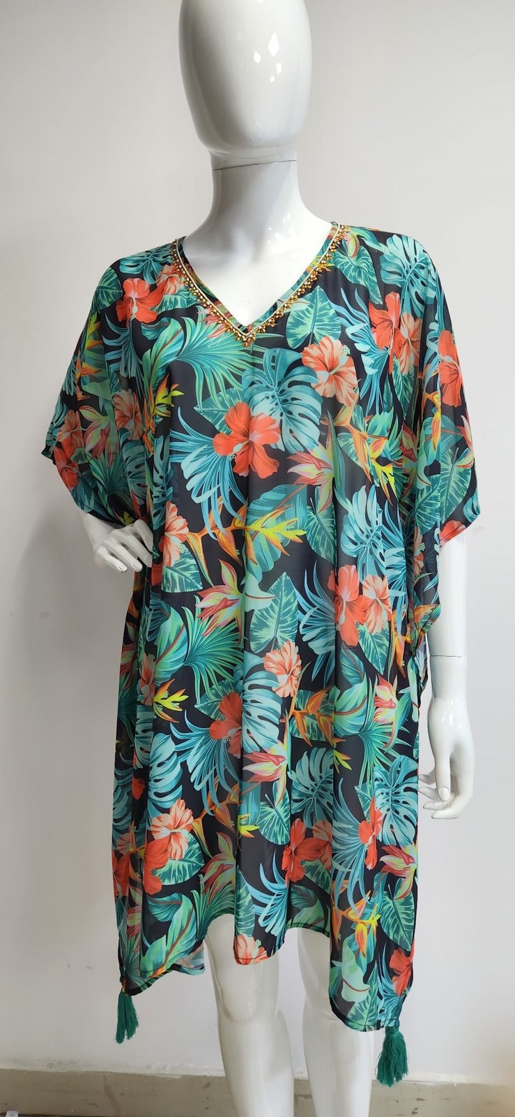 Tropical digital print short kaftan top on a mannequin