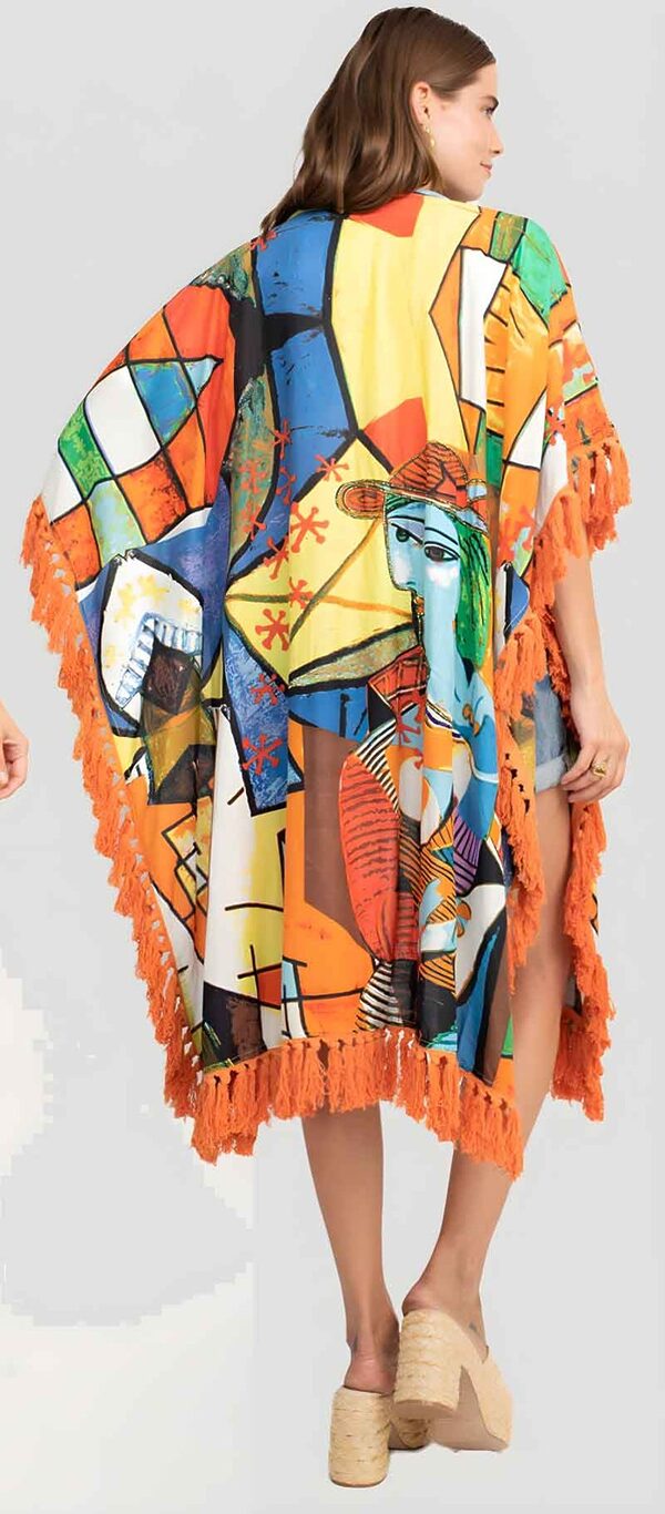 Back view of an orange-trimmed kimono wrap with a bold abstract print